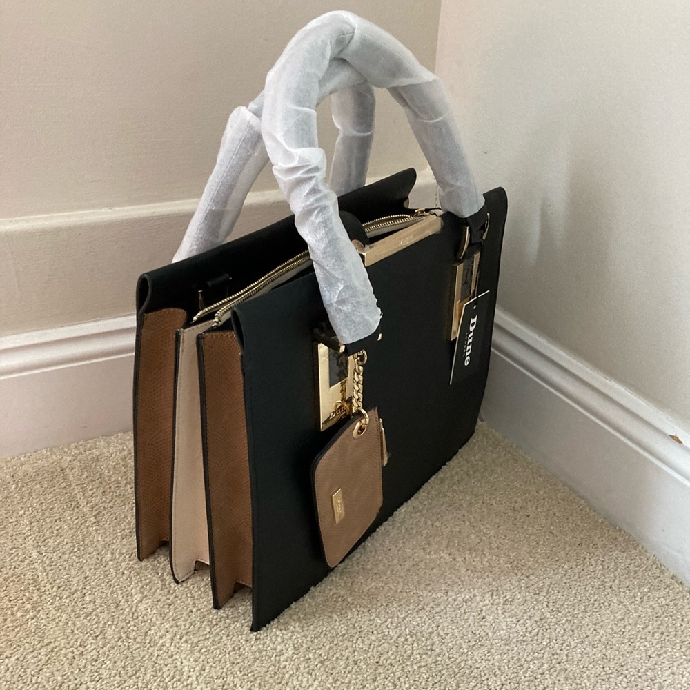 Dune Handbag. 13 inches by 10 inches. Shoulder strap and hand straps. Purse incl